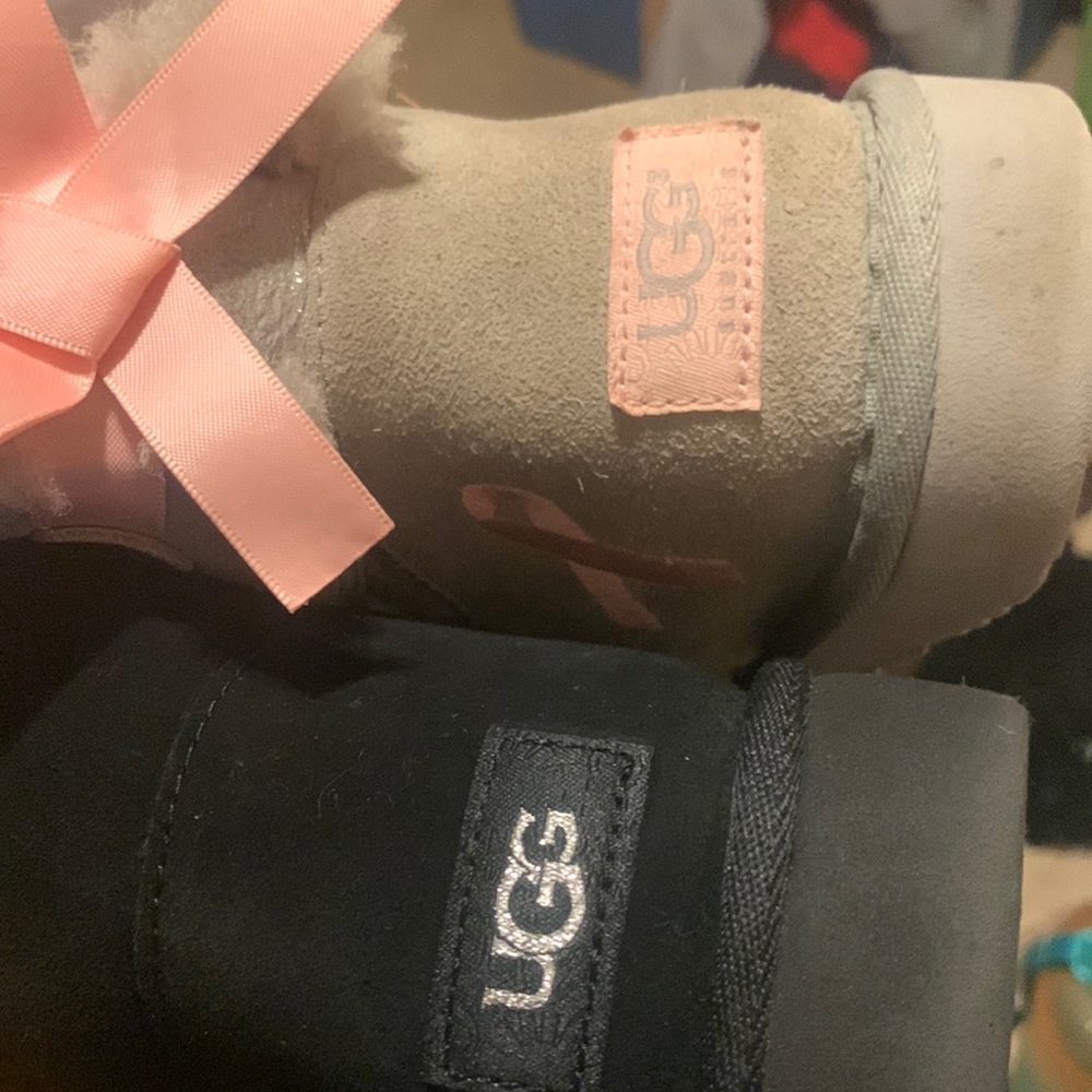 The black uggs are fake and the grey ones are real